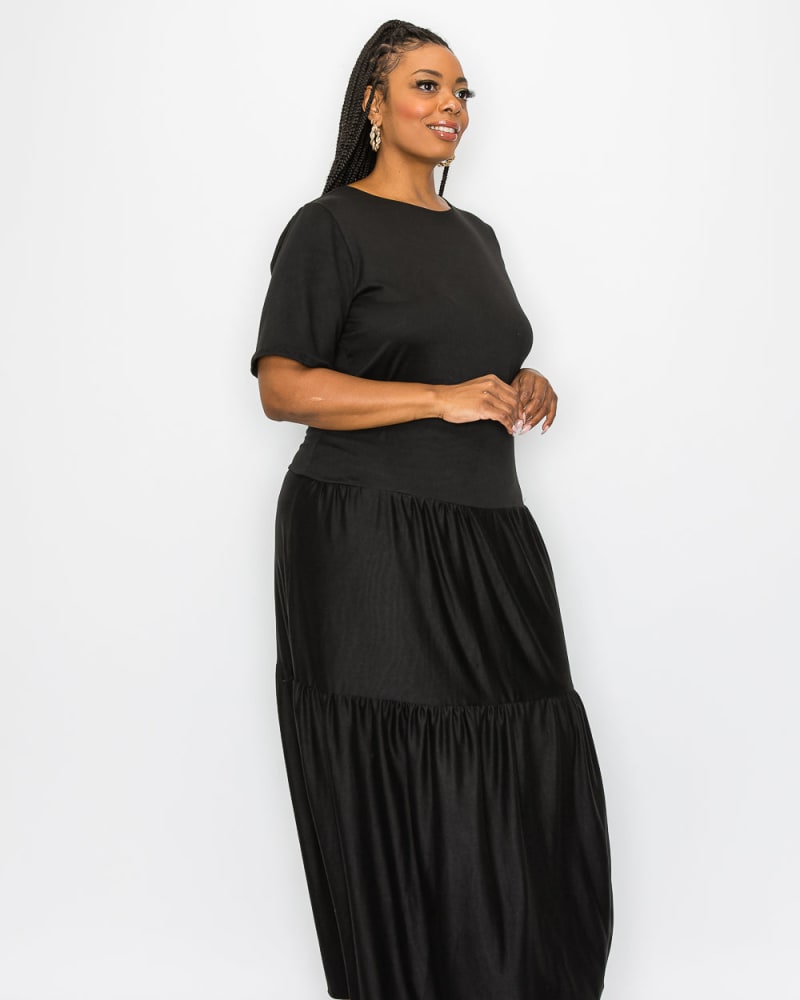 Front of a model wearing a size 1X Jourdan Tiered Maxi Dress in Black by L I V D. | dia_product_style_image_id:241818